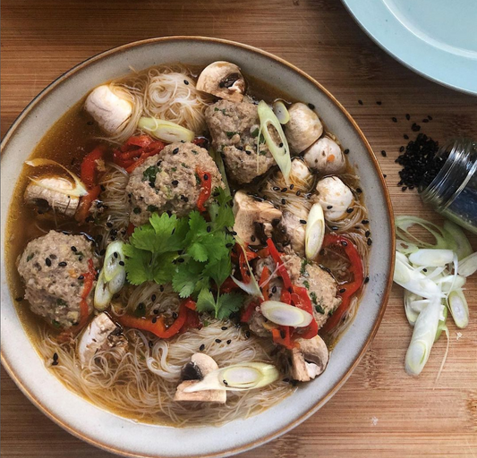 Ginger meatballs in a soy sauce broth