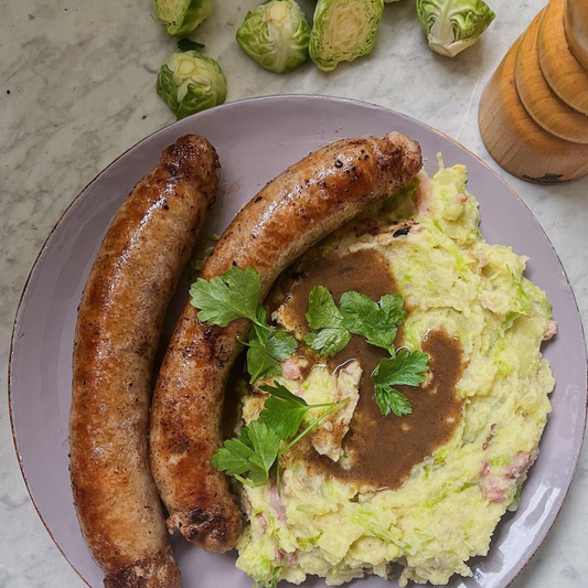 Sausages w/ brussels sprouts and bacon mash